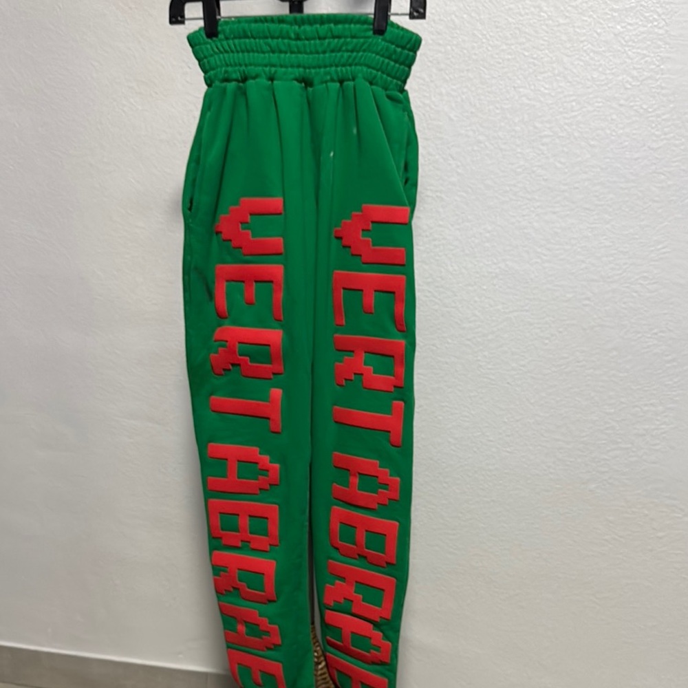 Green Sweatpants with Red Text